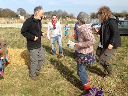 Worm Workshop on Saturday 29 March - led by Fred Miller , Local worm expert, a group of families are here seen "dancing for worms"